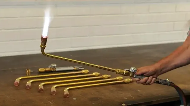 a welding torch produces a flame by burning
