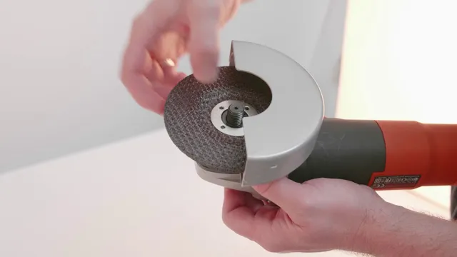 how to change cutting disc on angle grinder